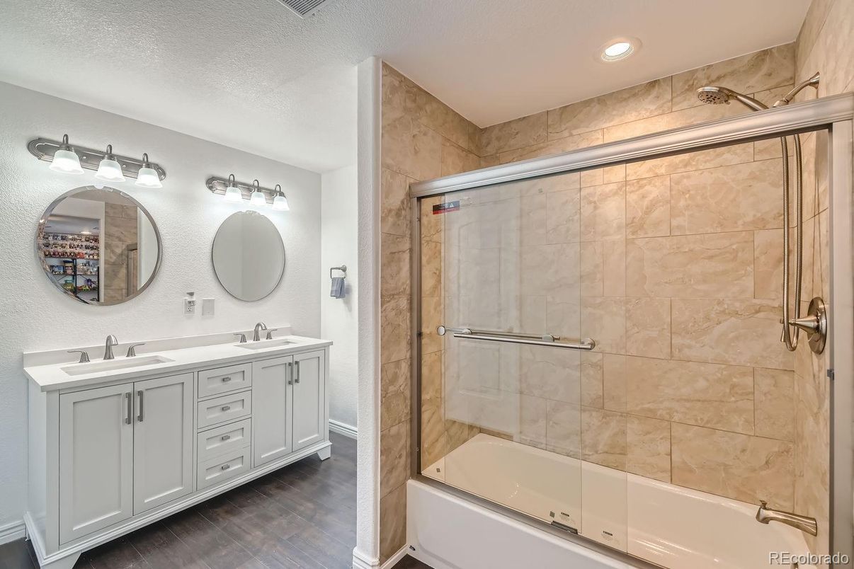 Bathroom, Dual Sink Vanities, Glass Shower, Interior, Recessed Lighting, Wood Texture Flooring