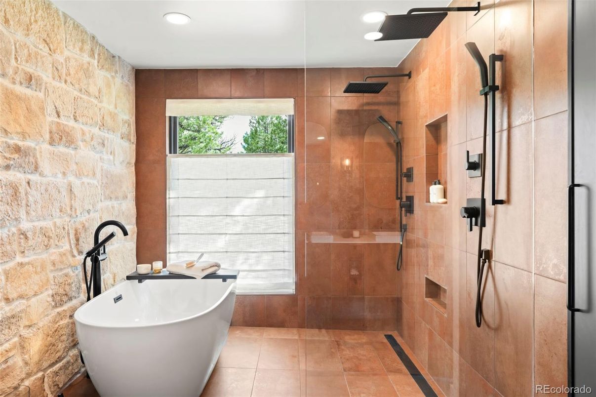 Bathroom, Free Standing Baths, Glass Shower, Interior, Recessed Lighting, Stone Walls
