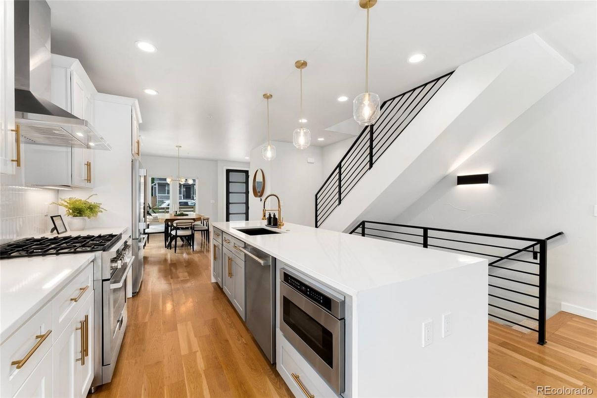 Dining room, Interior, Kitchen, Pendant Lights, Recessed Lighting, Stainless Steel Appliances, Wood Texture Flooring