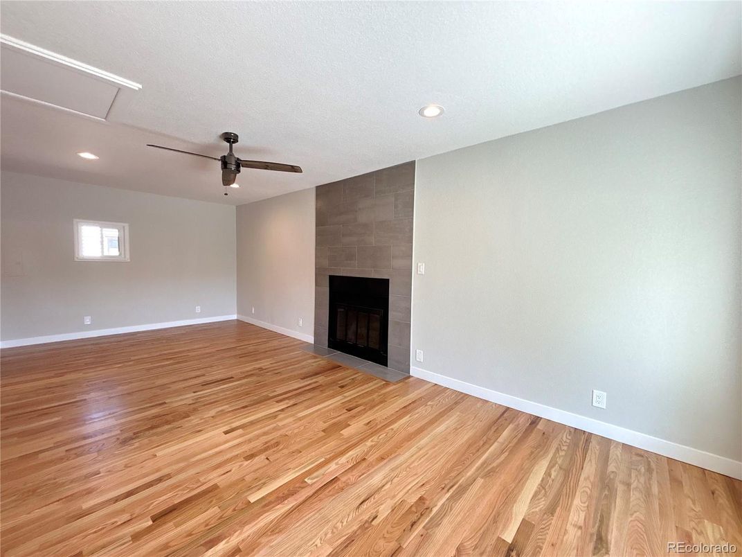 Empty room, Fireplace, Interior, Recessed Lighting, Wood Texture Flooring