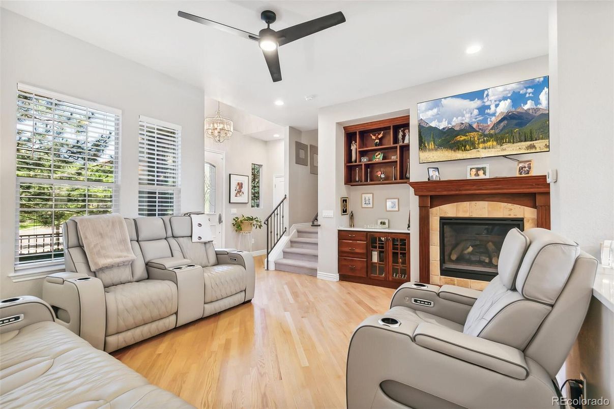 Chandelier, Home Theatre Room, Fireplace, Interior, Living room, Recessed Lighting, Wood Texture Flooring