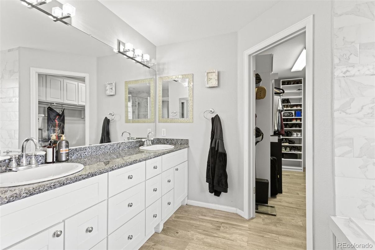 Bathroom, Dual Sink Vanities, Interior, Marble Walls, Walk-in Closets, Wood Texture Flooring