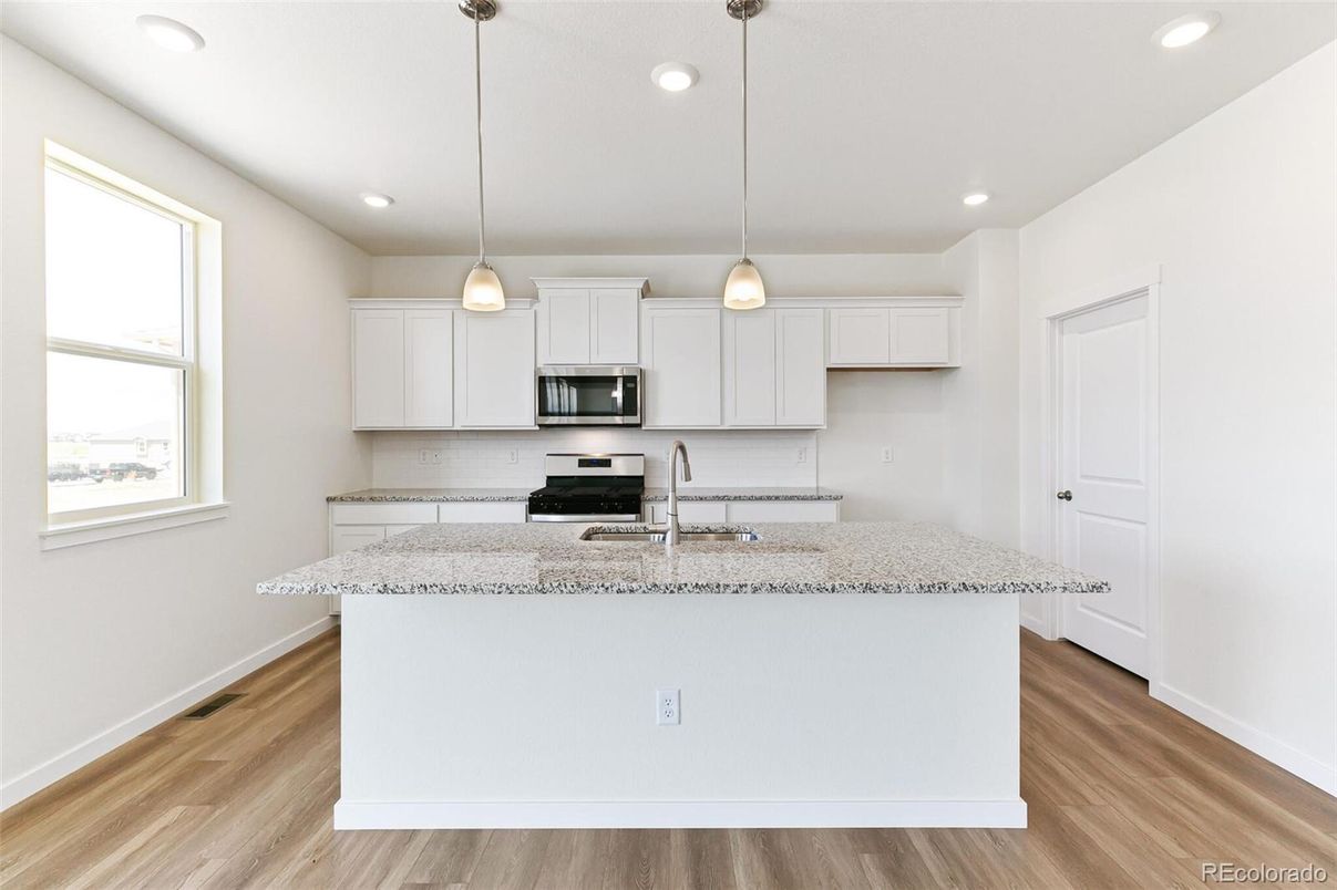 Interior, Kitchen, Pendant Lights, Recessed Lighting, Stainless Steel Appliances, Wood Texture Flooring