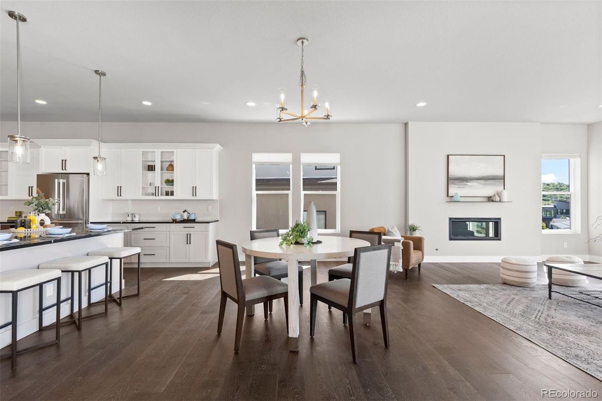 Dining room, Interior, Kitchen, Pendant Lights, Recessed Lighting, Stainless Steel Appliances, Wood Texture Flooring