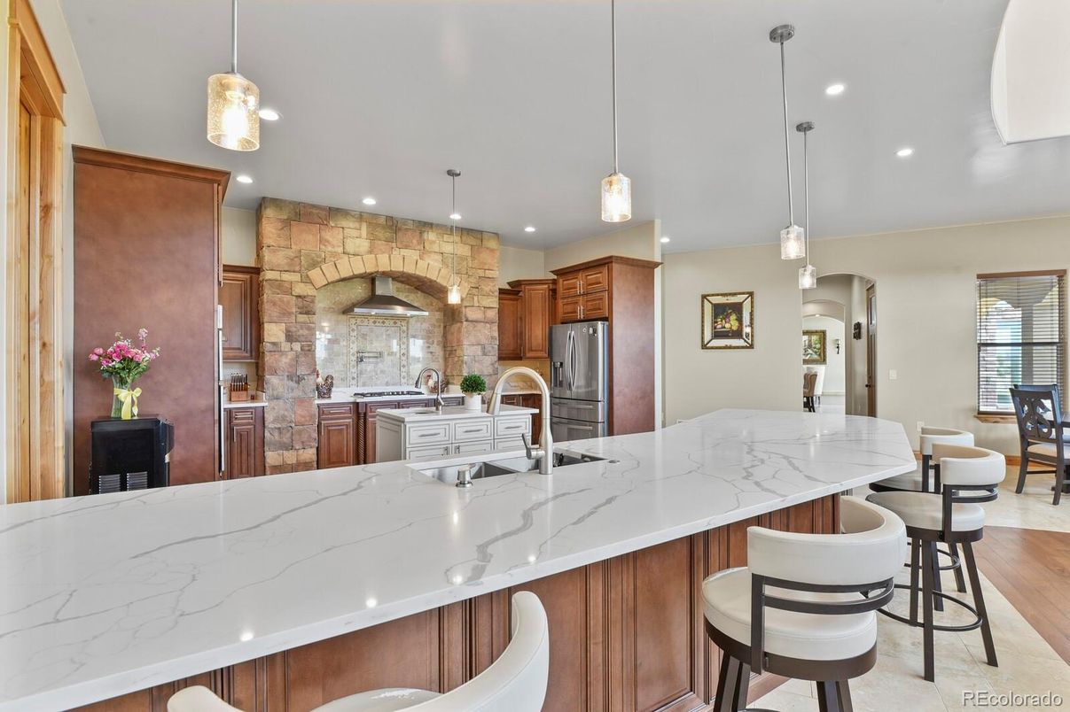 Interior, Kitchen, Pendant Lights, Recessed Lighting, Stainless Steel Appliances, Stone Walls, Wood Texture Flooring