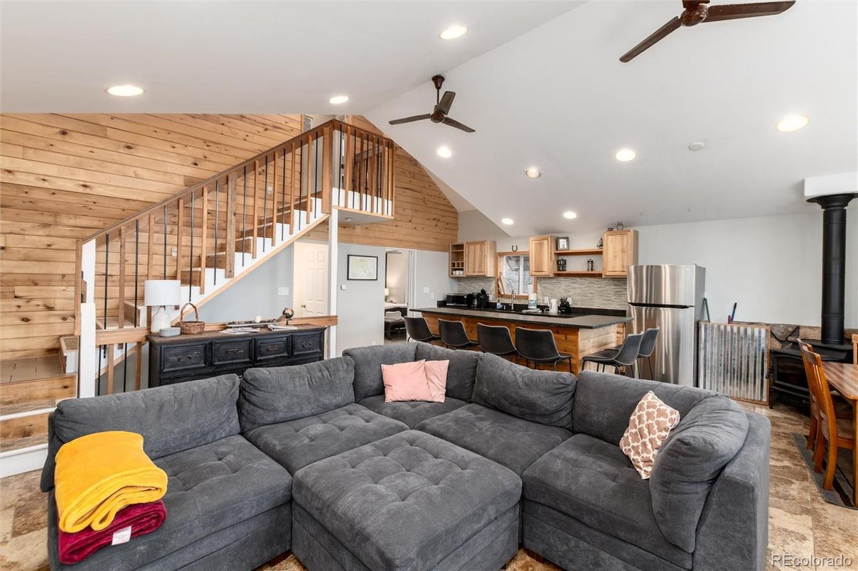 Dining room, Interior, Kitchen, Living room, Recessed Lighting, Stainless Steel Appliances, Wooden Ceilings, Wooden Walls