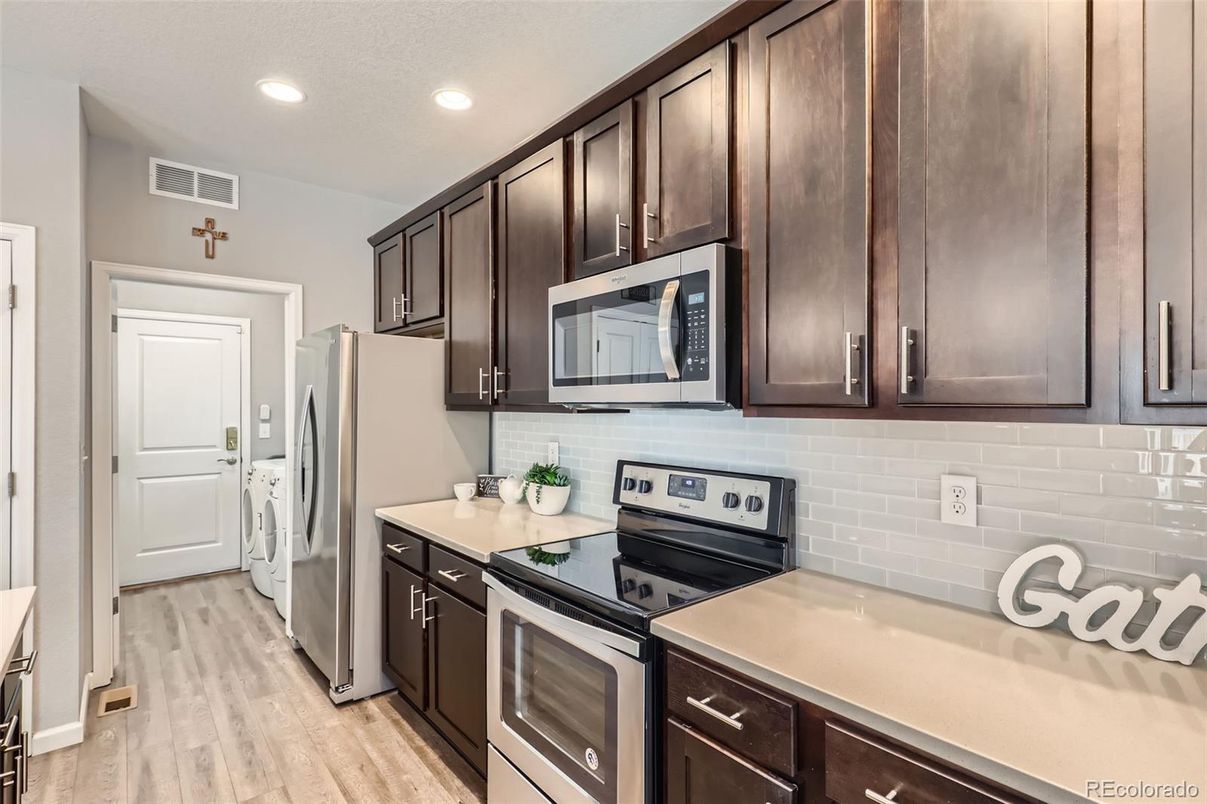 Interior, Kitchen, Recessed Lighting, Stainless Steel Appliances, Wood Texture Flooring