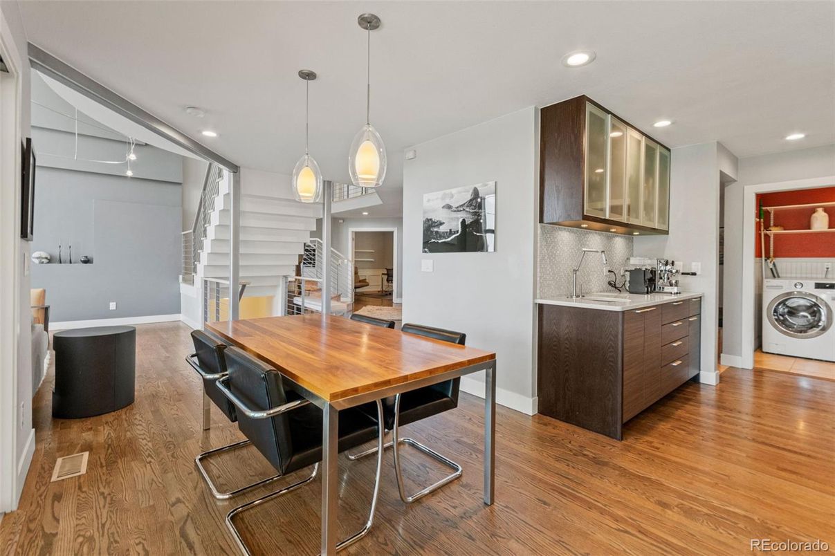 Dining room, Interior, Kitchen, Pendant Lights, Recessed Lighting, Utility Closets, Washer, Wood Texture Flooring