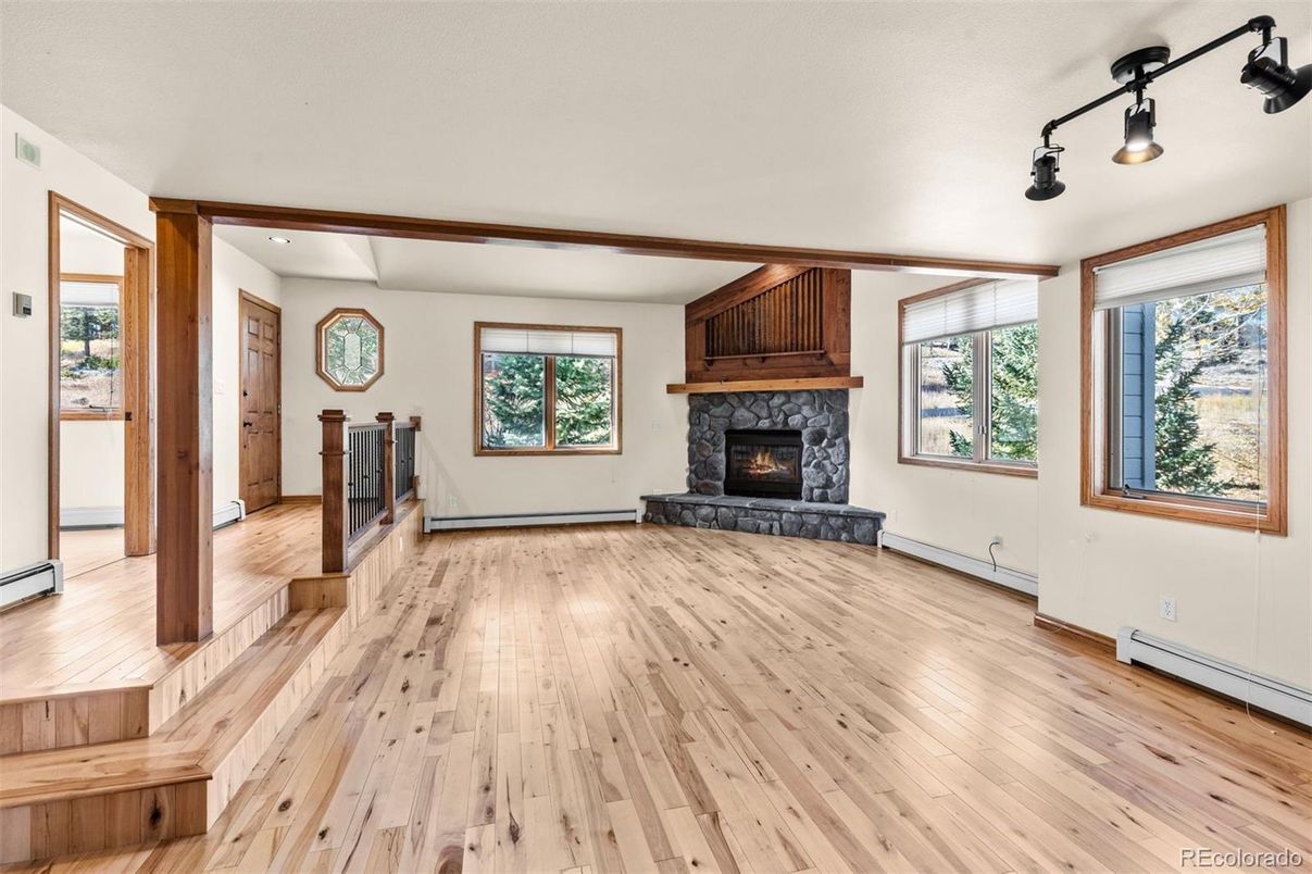 Empty room, Fireplace, Interior, Recessed Lighting, Wood Texture Flooring