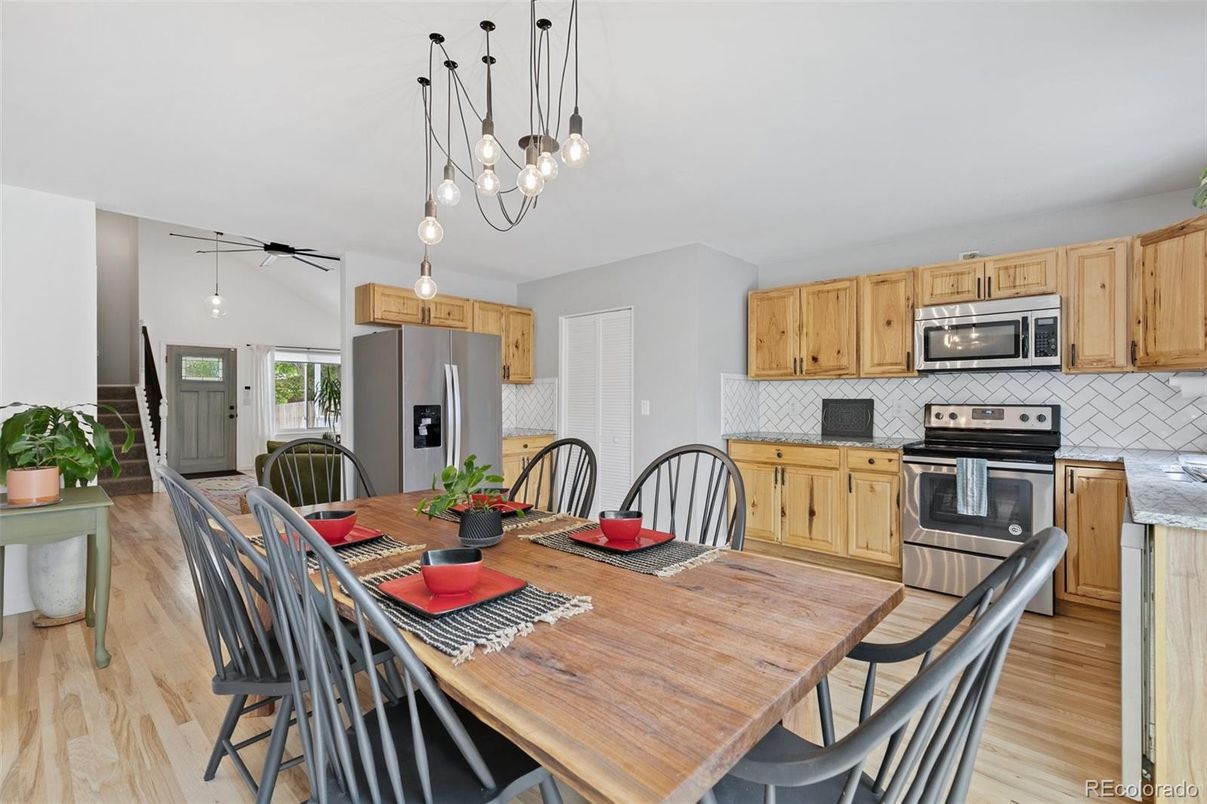 Dining room, Interior, Kitchen, Pendant Lights, Stainless Steel Appliances, Wood Texture Flooring