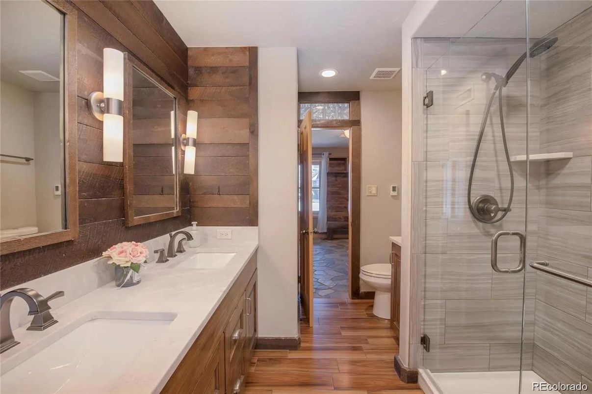 Bathroom, Dual Sink Vanities, Glass Shower, Interior, Recessed Lighting, Wood Texture Flooring
