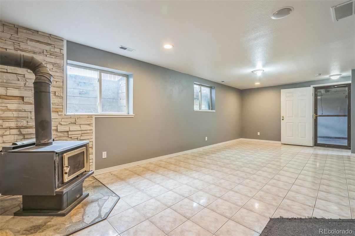 Empty room, Fireplace, Interior, Recessed Lighting, Stone Walls