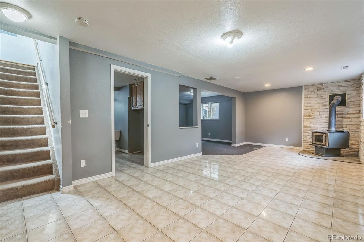 Empty room, Fireplace, Interior, Recessed Lighting, Stone Walls