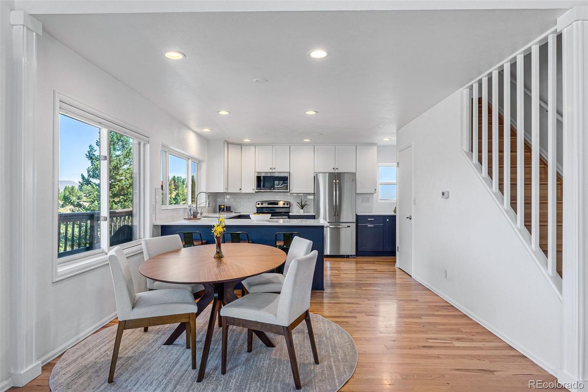 Dining room, Interior, Kitchen, Recessed Lighting, Stainless Steel Appliances, Wood Texture Flooring