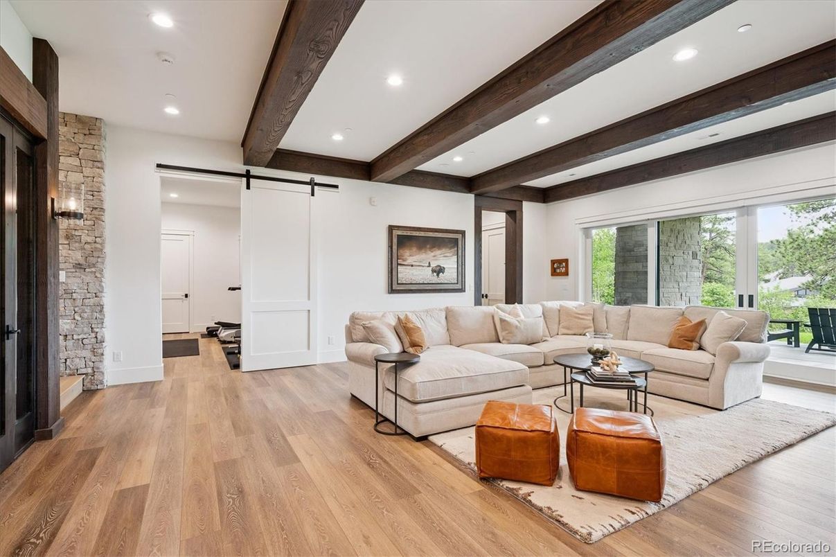 Fireplace, Interior, Living room, Recessed Lighting, Stone Walls, Wooden Beams, Wood Texture Flooring