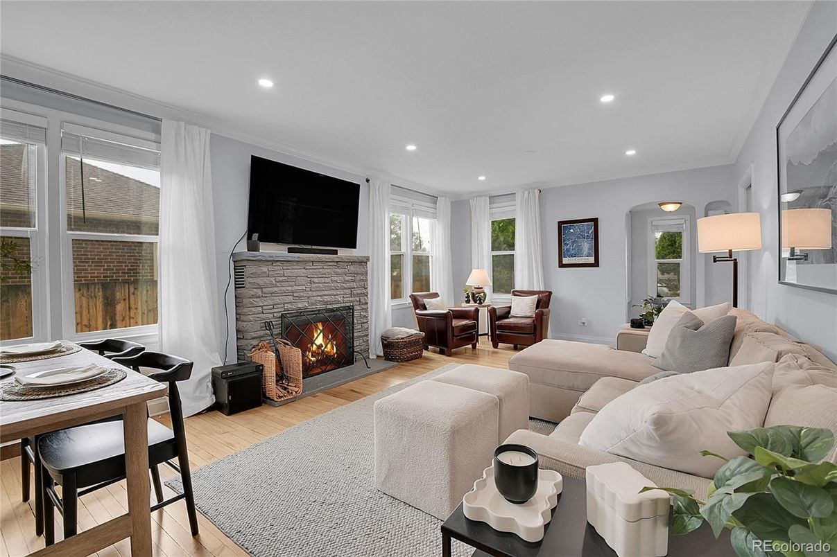 Dining room, Fireplace, Interior, Living room, Recessed Lighting, Wood Texture Flooring