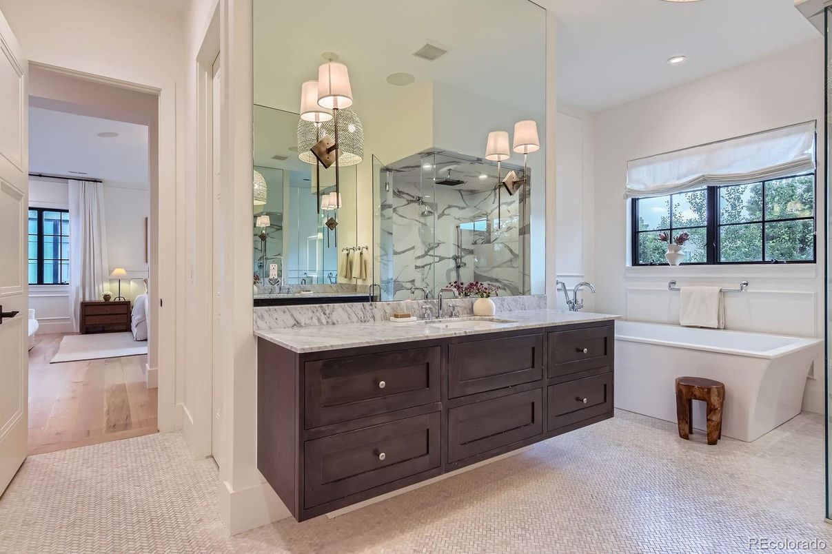 Bathroom, Free Standing Baths, Glass Shower, Interior, Marble Walls, Recessed Lighting, Wood Texture Flooring