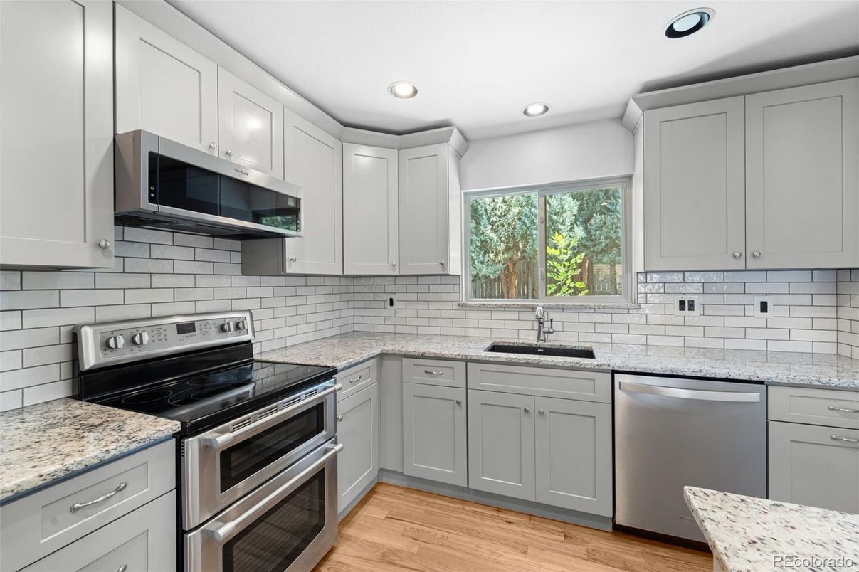 Interior, Kitchen, Recessed Lighting, Stainless Steel Appliances, Wood Texture Flooring