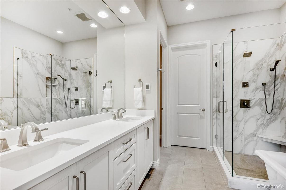 Bathroom, Dual Sink Vanities, Glass Shower, Interior, Marble Walls, Recessed Lighting