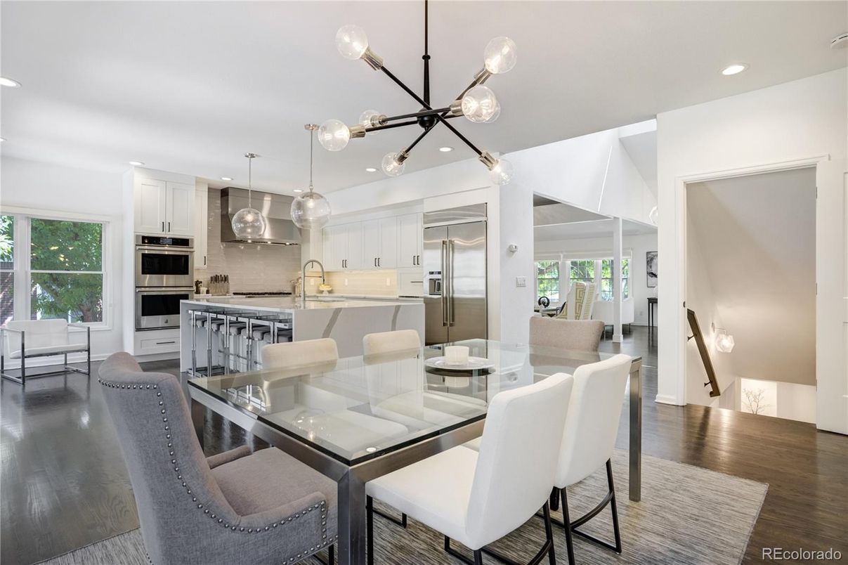 Dining room, Interior, Kitchen, Pendant Lights, Recessed Lighting, Stainless Steel Appliances, Wood Texture Flooring