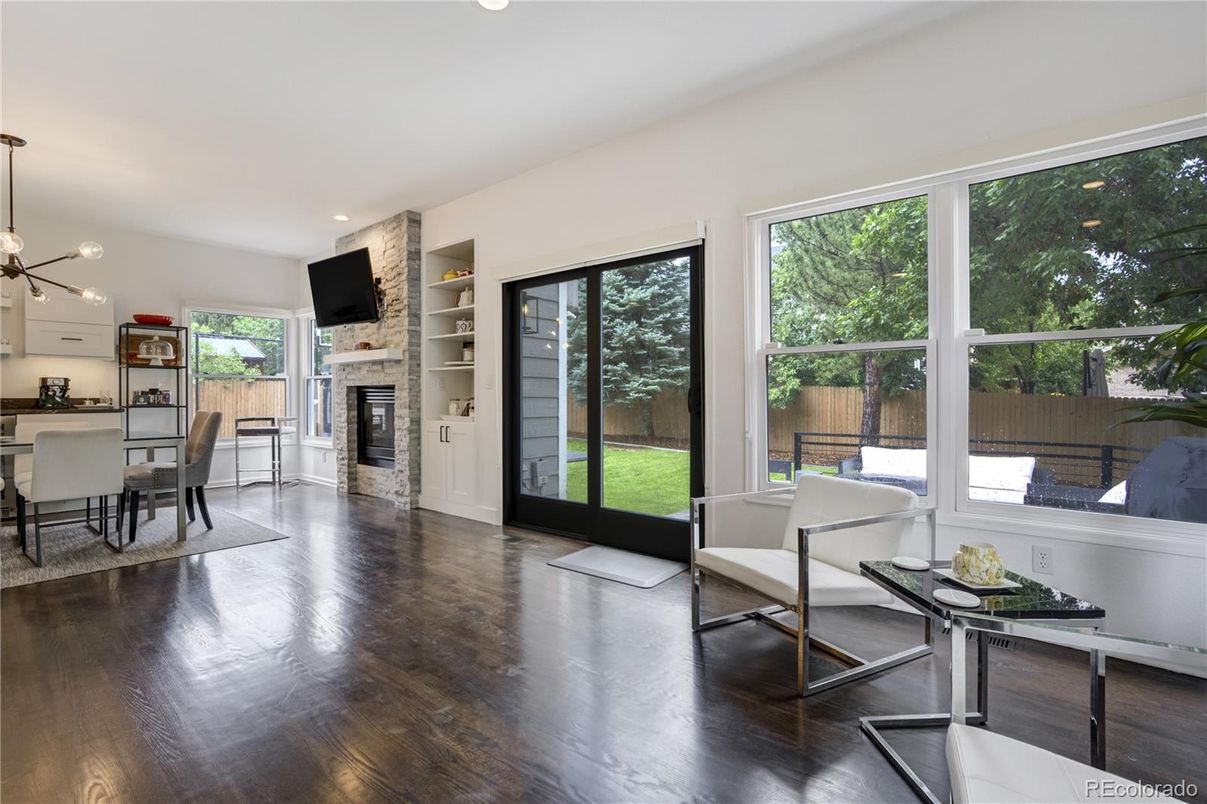 Dining room, Fireplace, Interior, Pendant Lights, Recessed Lighting, Wood Texture Flooring