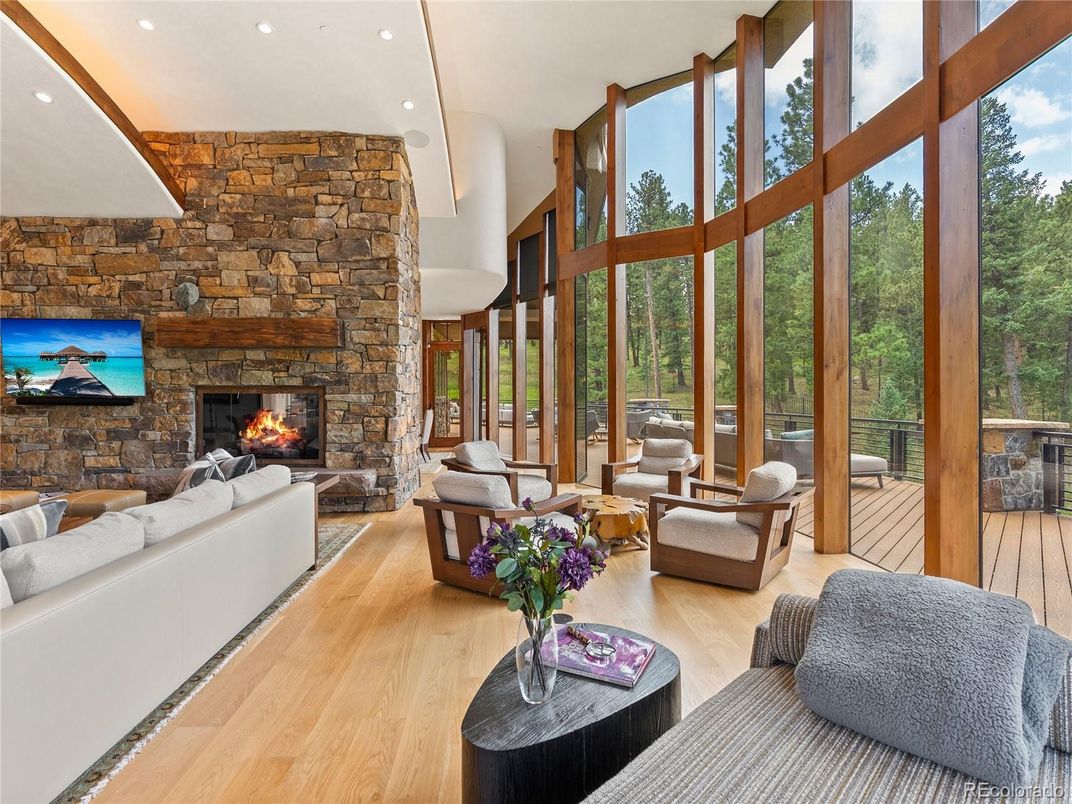 Fireplace, Interior, Living room, Recessed Lighting, Stone Walls, Wood Texture Flooring