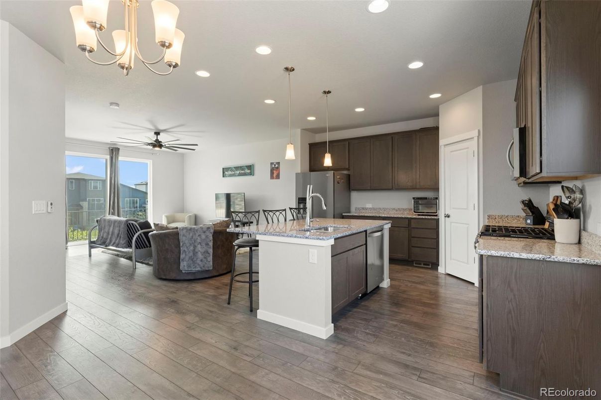Chandelier, Dining room, Interior, Kitchen, Living room, Pendant Lights, Recessed Lighting, Wood Texture Flooring