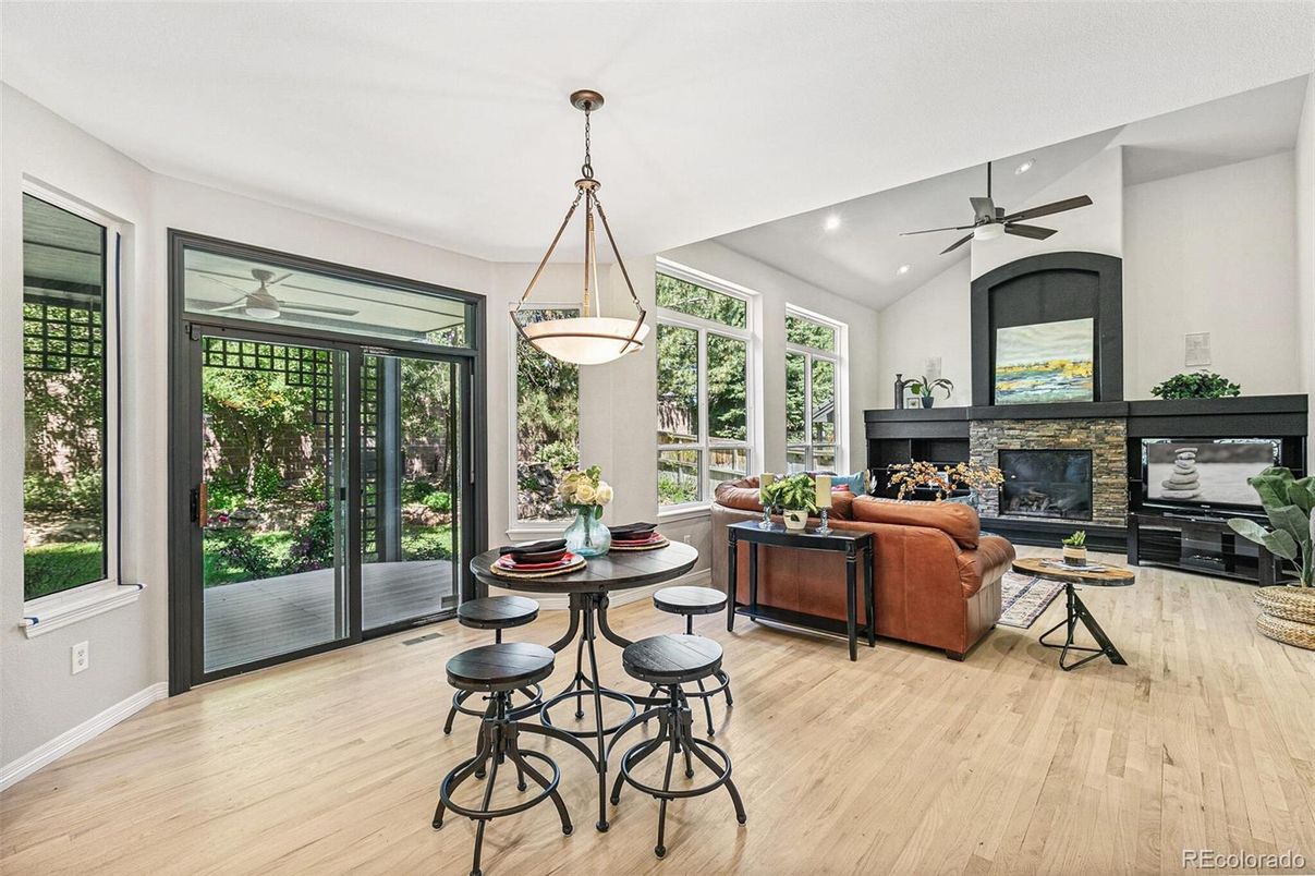 Dining room, Fireplace, Interior, Living room, Pendant Lights, Recessed Lighting, Wood Texture Flooring