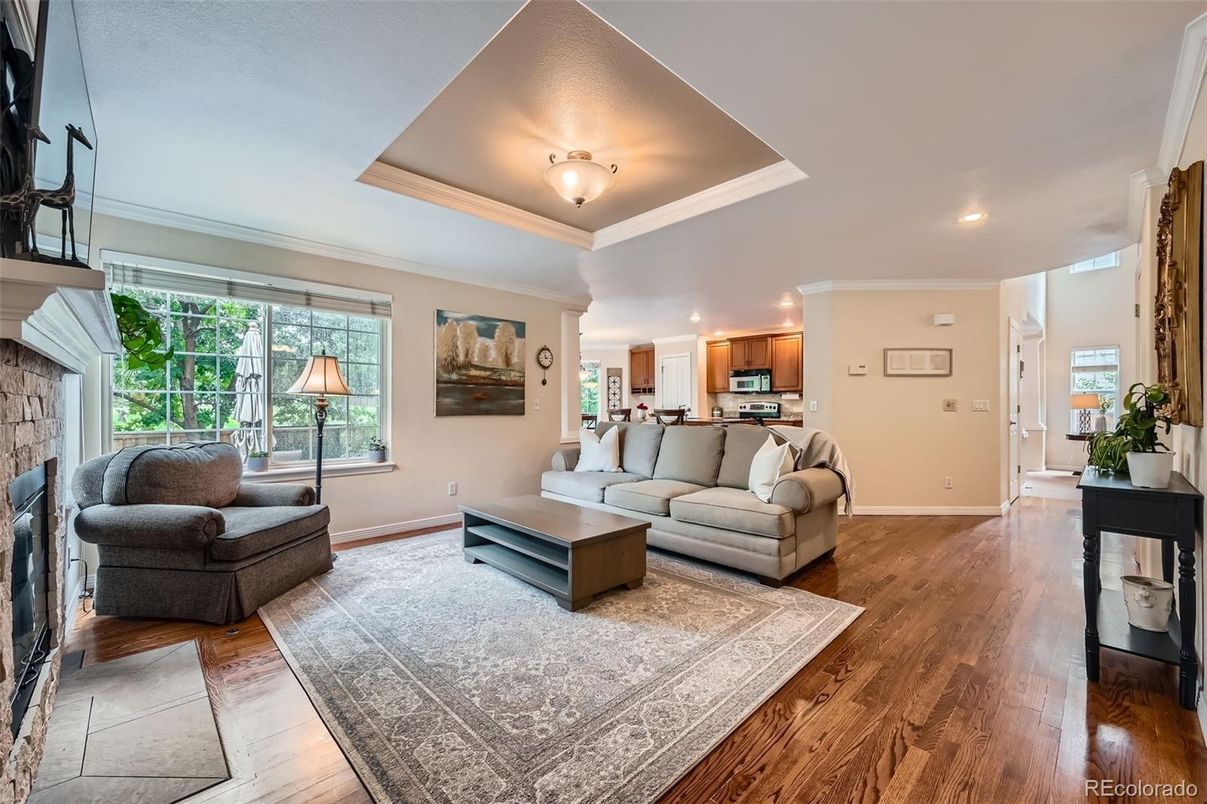Fireplace, Interior, Kitchen, Living room, Recessed Lighting, Stainless Steel Appliances, Wood Texture Flooring