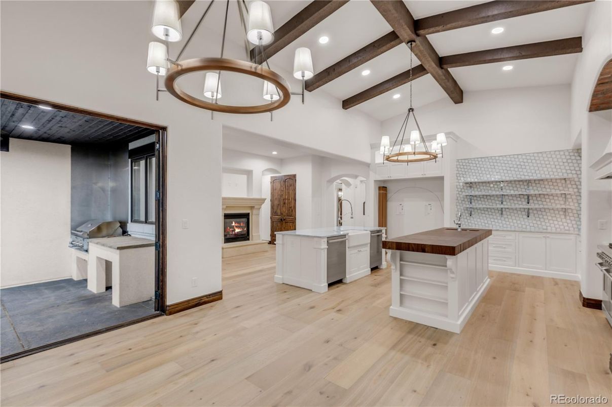 Chandelier, Fireplace, Interior, Kitchen, Pendant Lights, Recessed Lighting, Wooden Beams, Wood Texture Flooring