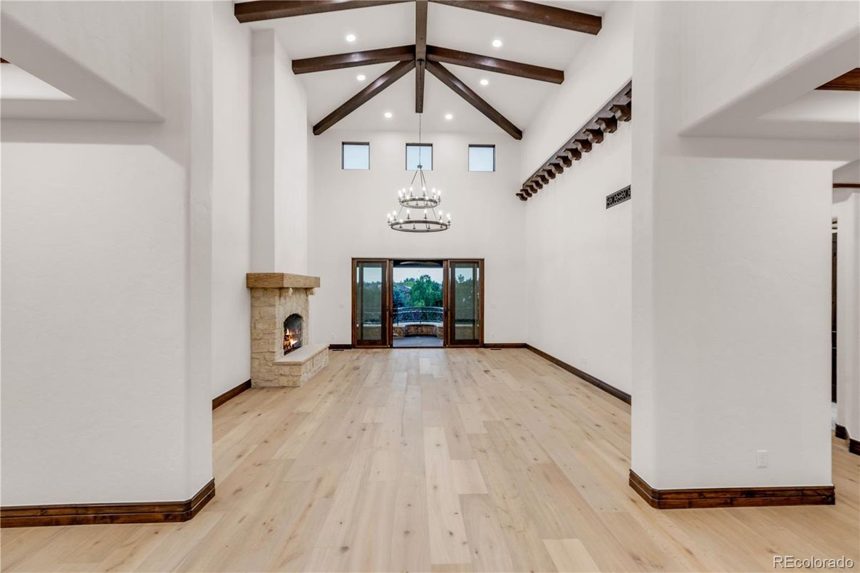 Chandelier, Fireplace, Interior, Pendant Lights, Recessed Lighting, Wooden Beams, Wood Texture Flooring