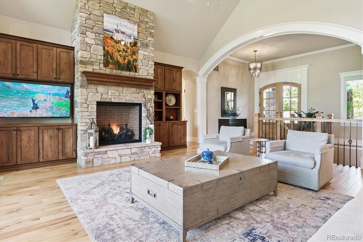 Chandelier, Fireplace, Interior, Living room, Stone Walls, Wood Texture Flooring