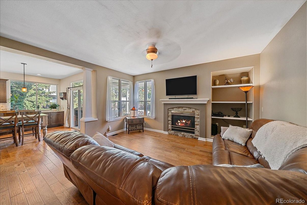 Dining room, Fireplace, Interior, Living room, Pendant Lights, Wood Texture Flooring