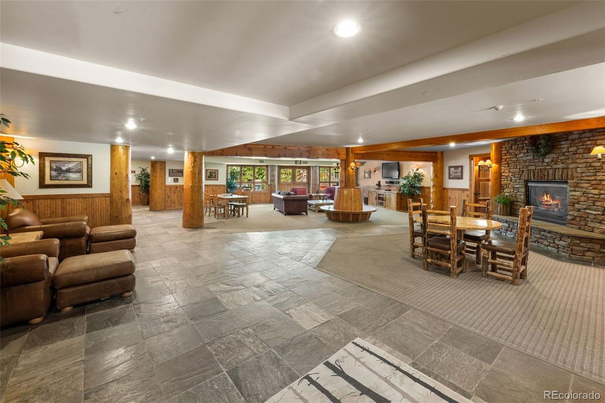 Dining room, Fireplace, Interior, Living room, Recessed Lighting, Stone Walls
