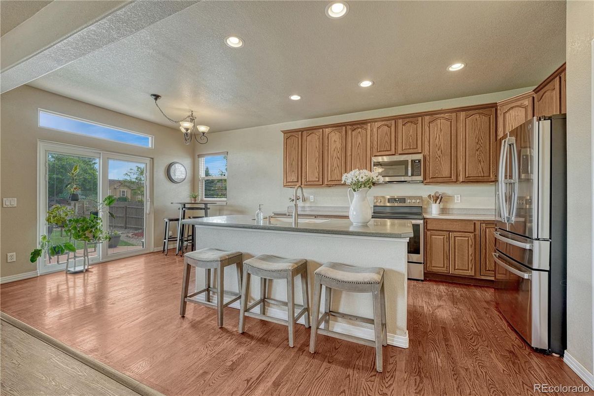 Chandelier, Interior, Kitchen, Recessed Lighting, Stainless Steel Appliances, Wood Texture Flooring