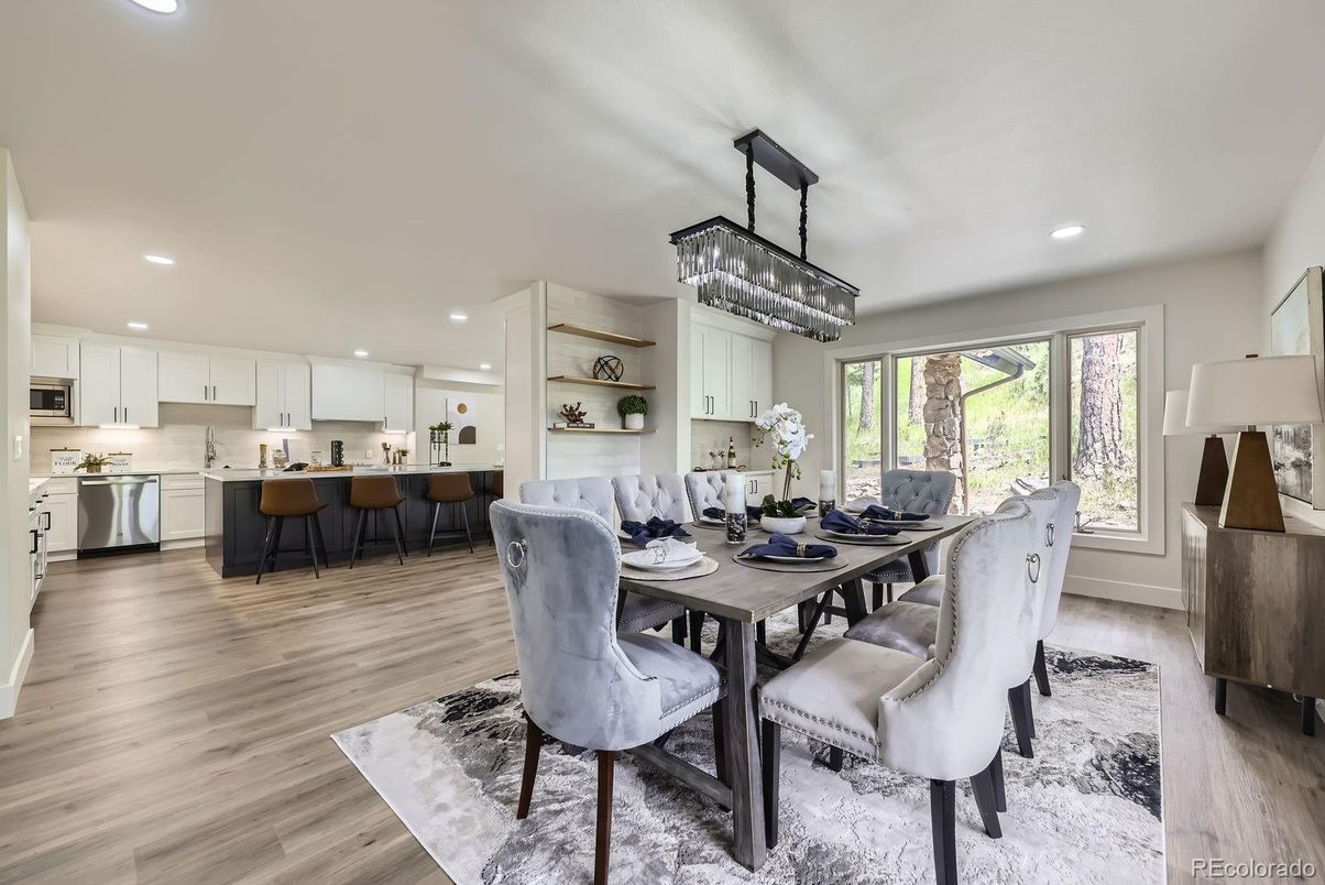 Chandelier, Dining room, Interior, Kitchen, Recessed Lighting, Stainless Steel Appliances, Wood Texture Flooring