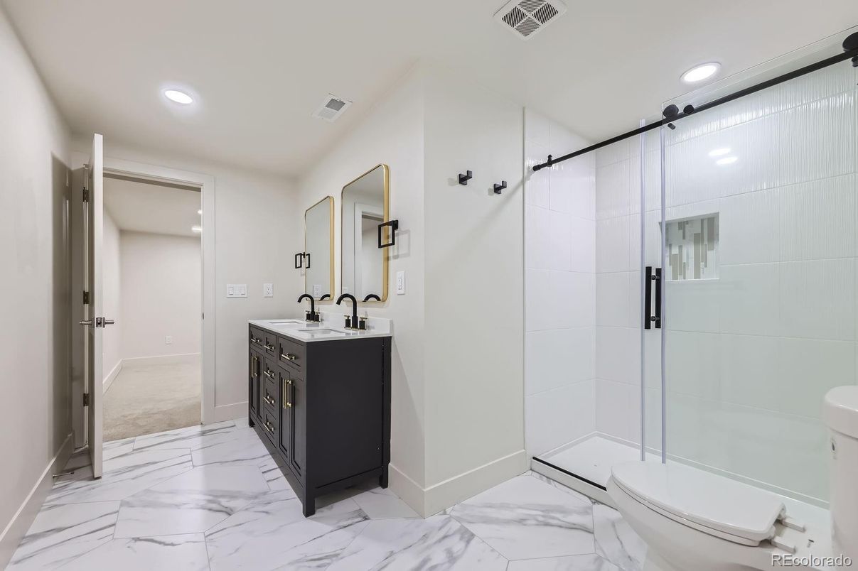 Bathroom, Dual Sink Vanities, Glass Shower, Interior, Marble, Recessed Lighting