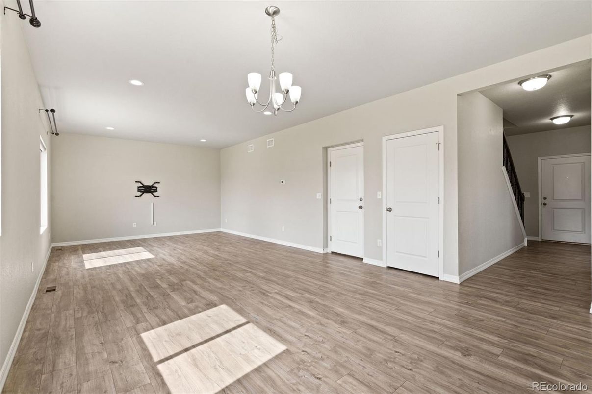Chandelier, Empty room, Interior, Recessed Lighting, Wood Texture Flooring
