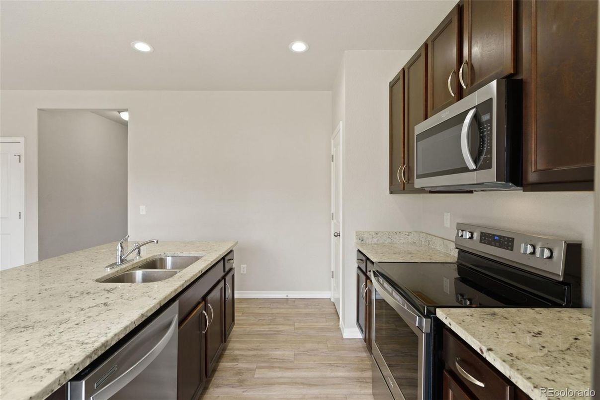 Interior, Kitchen, Recessed Lighting, Stainless Steel Appliances, Wood Texture Flooring