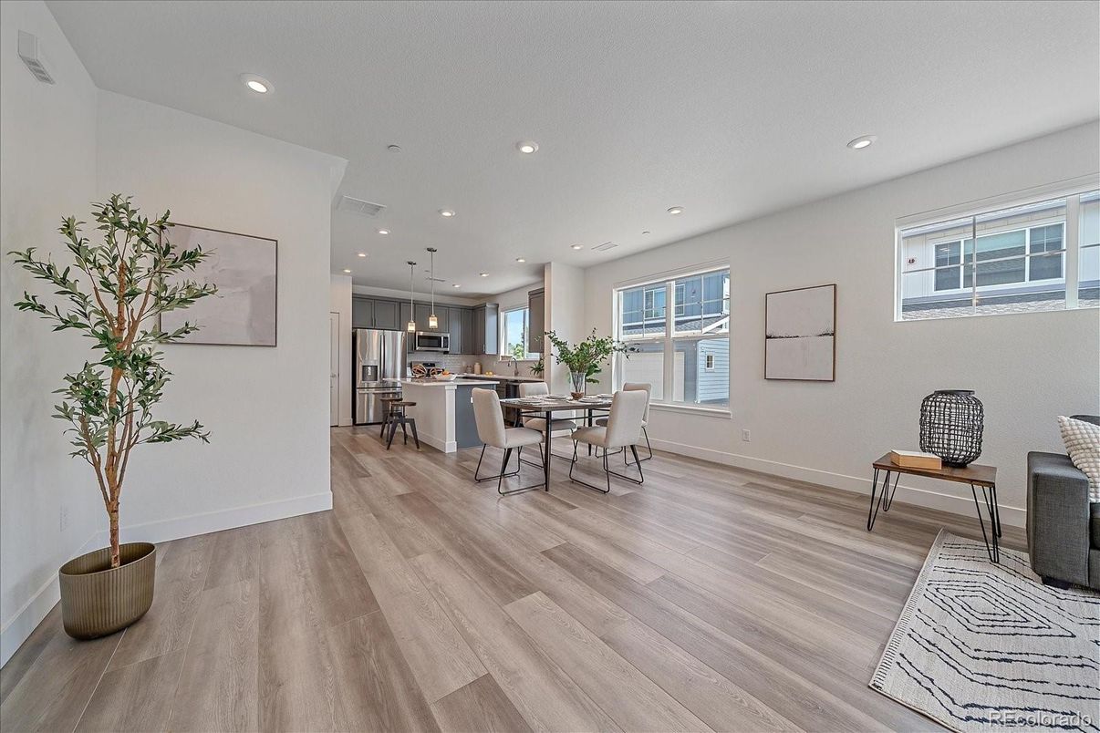 Dining room, Interior, Kitchen, Pendant Lights, Recessed Lighting, Stainless Steel Appliances, Wood Texture Flooring