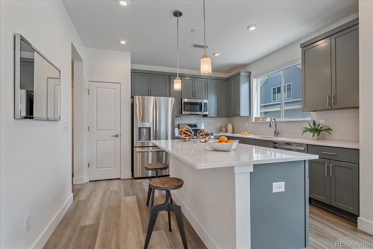 Interior, Kitchen, Pendant Lights, Recessed Lighting, Stainless Steel Appliances, Wood Texture Flooring
