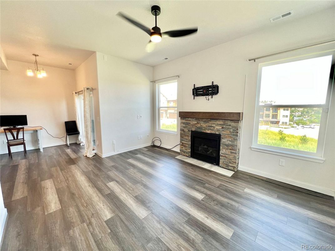 Empty room, Fireplace, Interior, Pendant Lights, Wood Texture Flooring