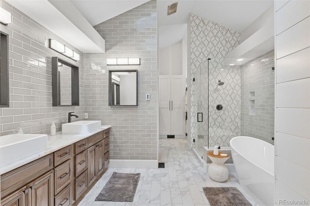 Bathroom, Dual Sink Vanities, Free Standing Baths, Glass Shower, Interior, Marble, Stone Walls