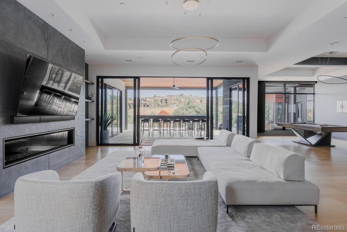 Billiard Table, Fireplace, Interior, Living room, Pendant Lights, Recessed Lighting, Wood Texture Flooring