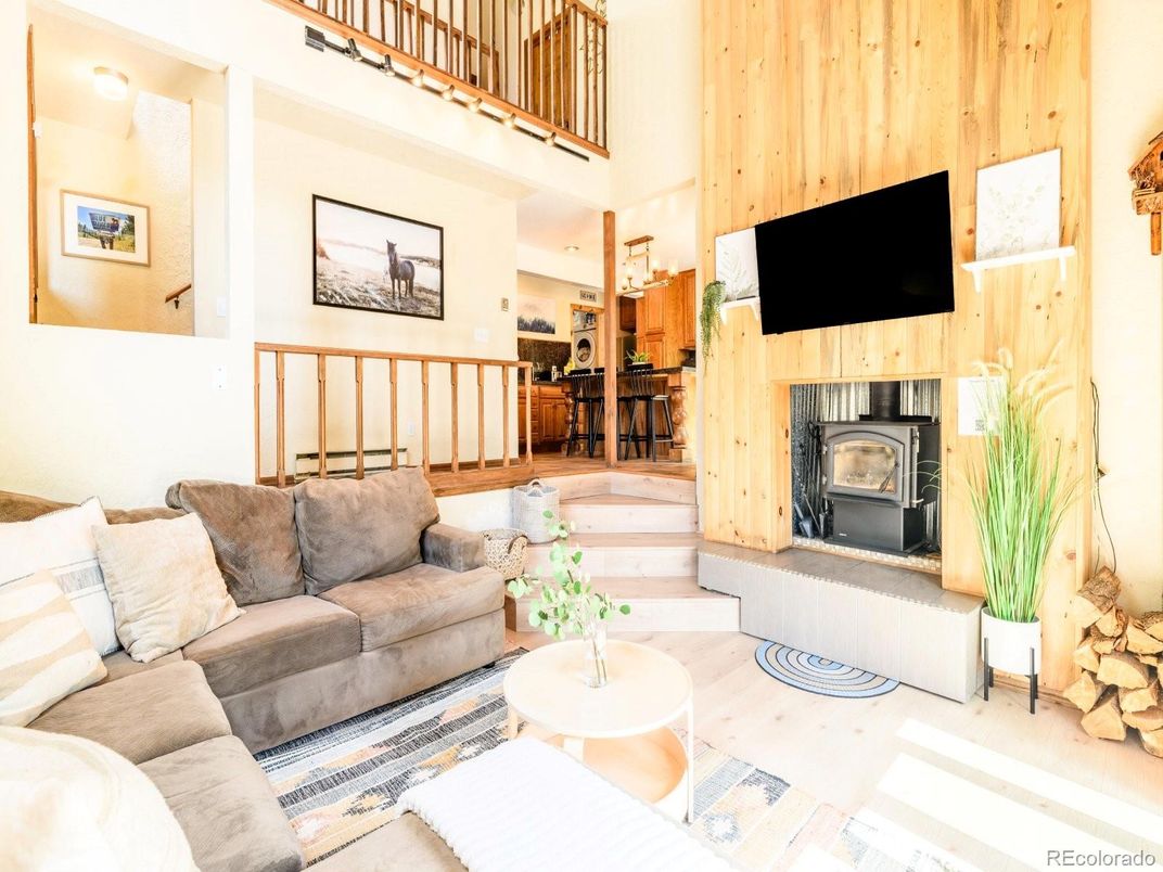 Fireplace, Interior, Living room, Recessed Lighting, Wood Texture Flooring, Wooden Walls
