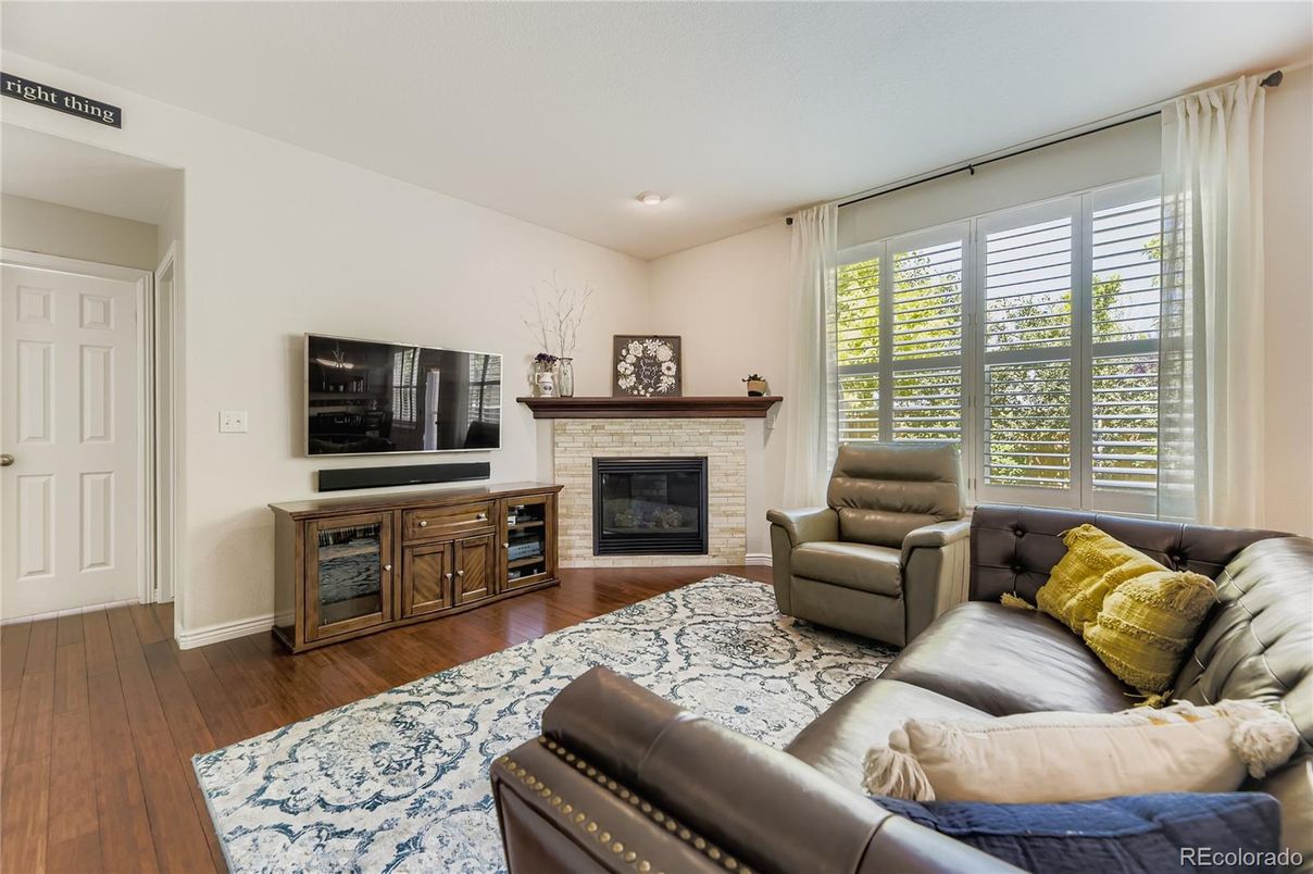 Fireplace, Interior, Living room, Recessed Lighting, Wood Texture Flooring
