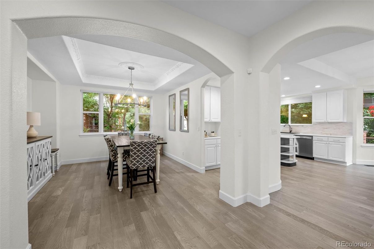 Chandelier, Dining room, Interior, Kitchen, Pendant Lights, Recessed Lighting, Stainless Steel Appliances, Wood Texture Flooring