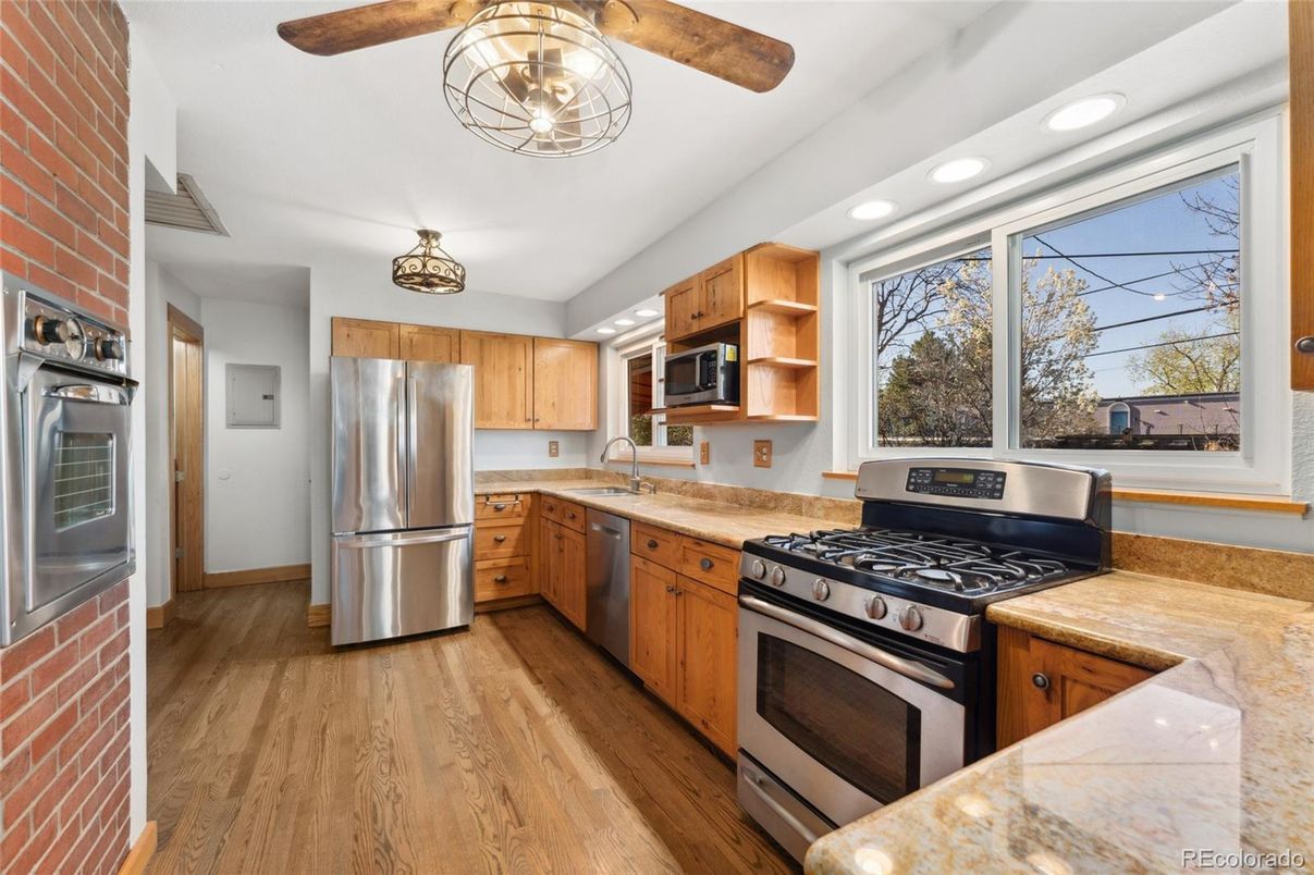 Interior, Kitchen, Recessed Lighting, Stainless Steel Appliances, Stone Walls, Wood Texture Flooring