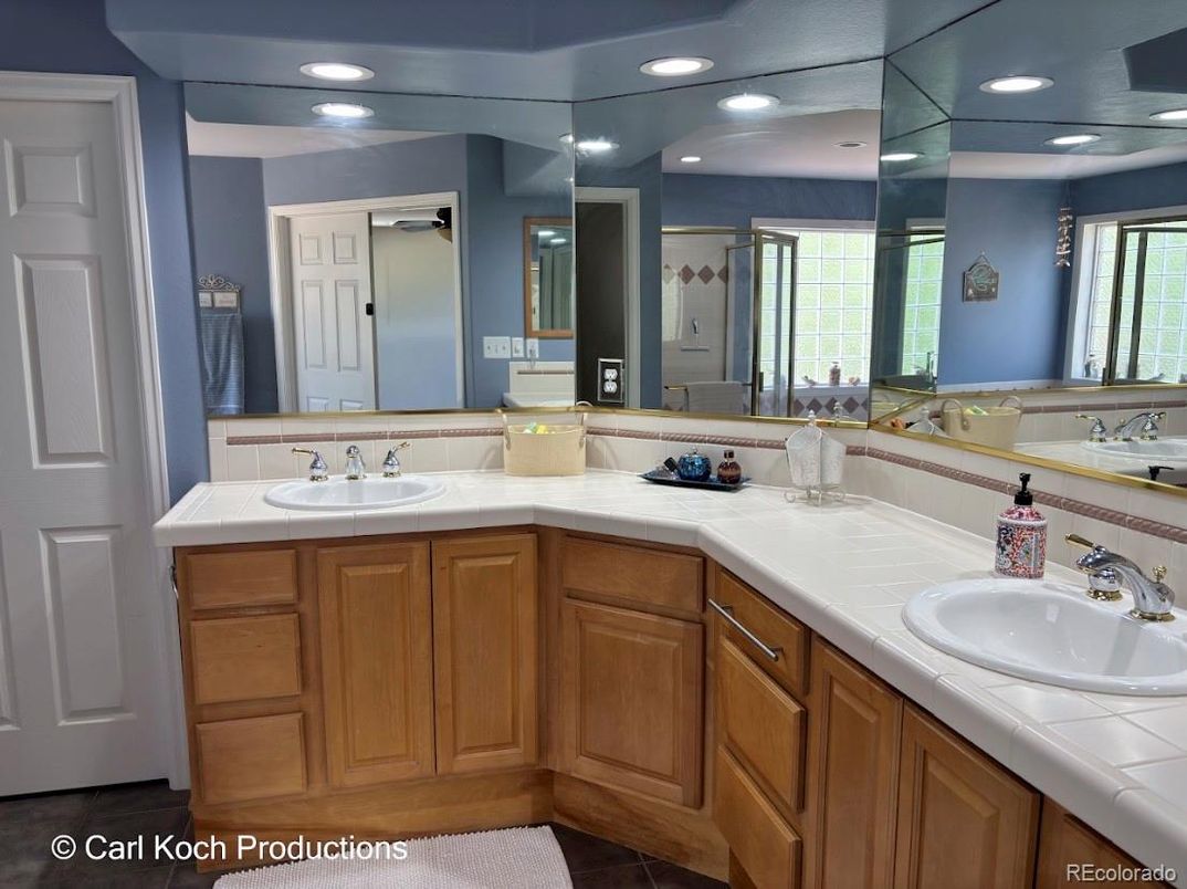 Bathroom, Dual Sink Vanities, Interior, Recessed Lighting, Tile Countertops