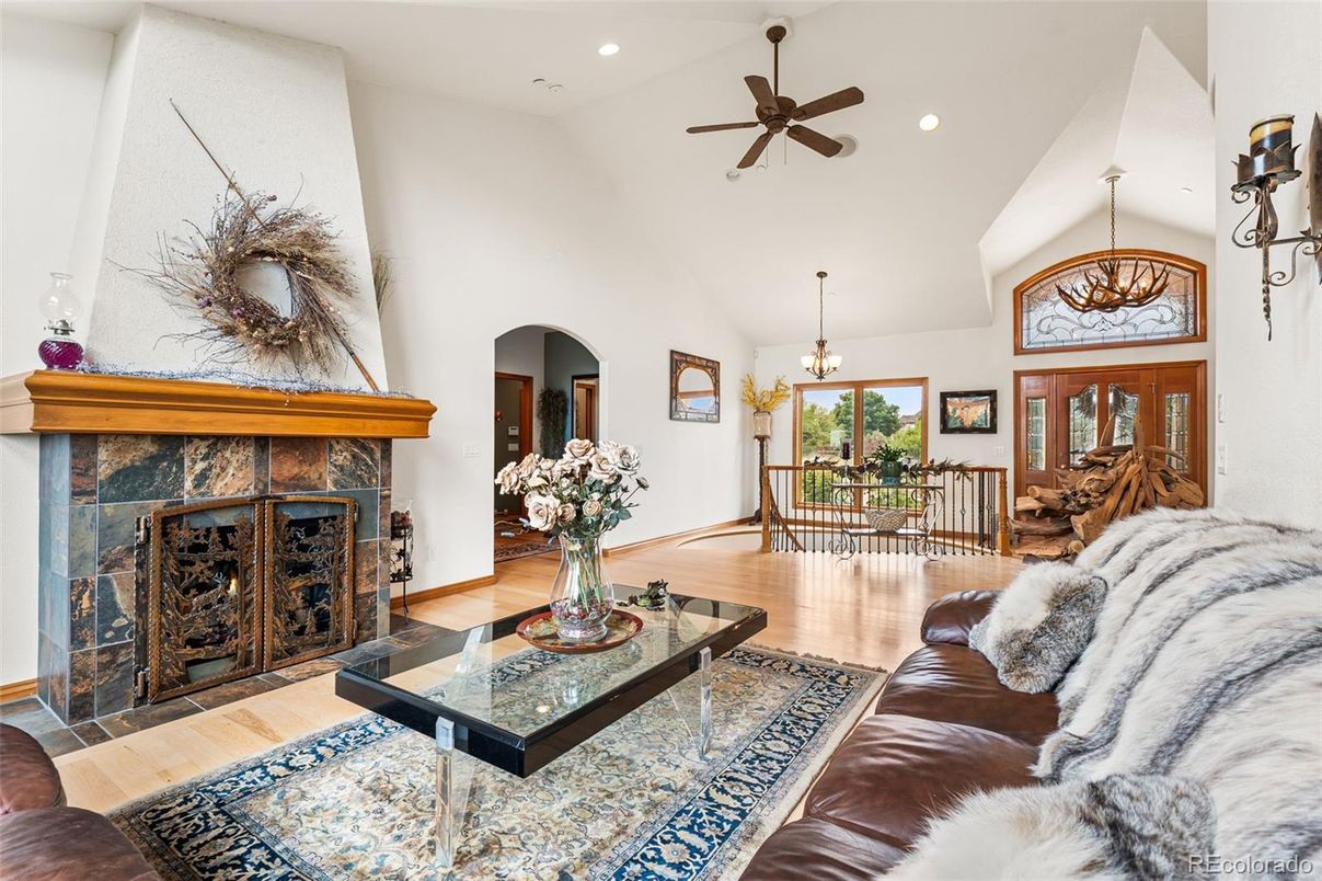 Chandelier, Dining room, Fireplace, Interior, Living room, Pendant Lights, Recessed Lighting, Wood Texture Flooring